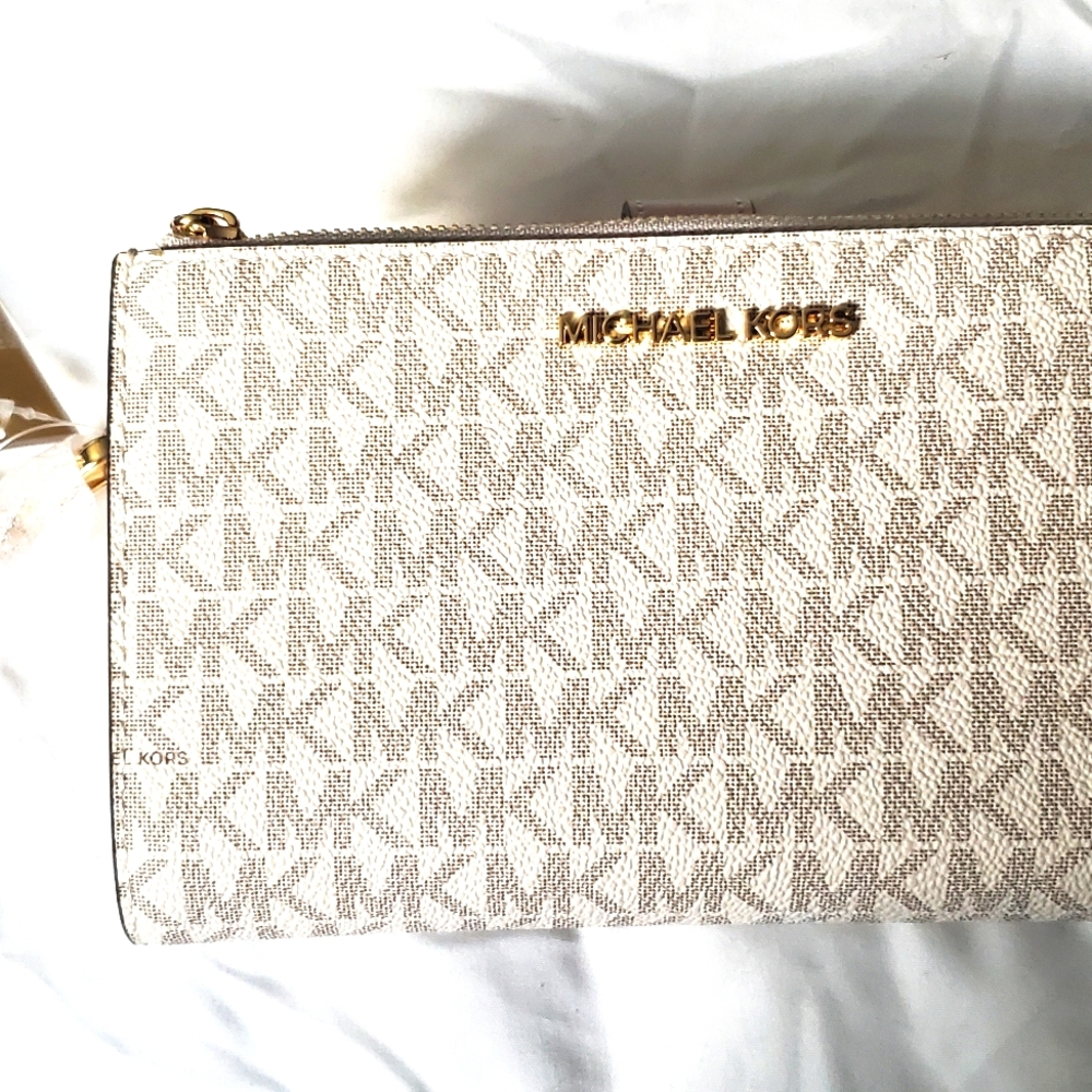 Michael Kors cream/blush wallet wristlet